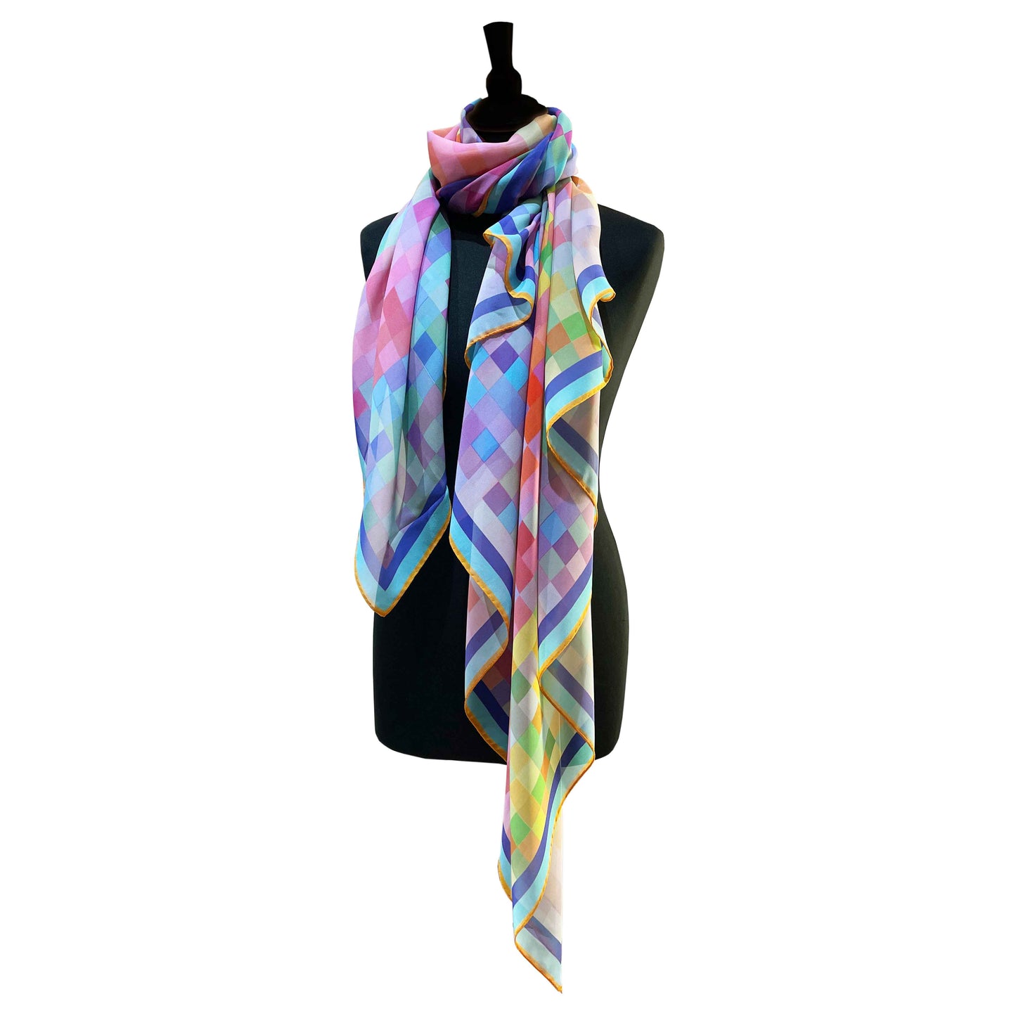 Foulard mit pixelartigem Design in lebendigen Farben, entworfen von Bernhard Duss.