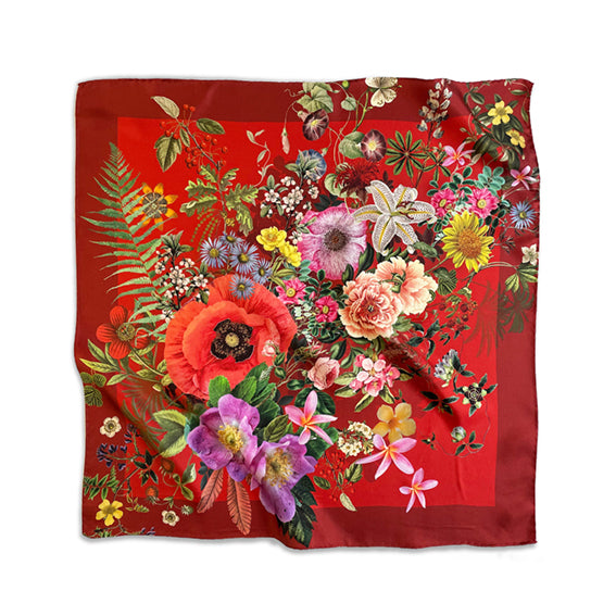Nickituch aus Seide mit farbenfrohen Blumenmotiven auf rotem Hintergrund